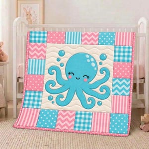 May include: A square baby quilt featuring a central cream-coloured panel with a large blue octopus graphic surrounded by bubbles. The border consists of a patchwork pattern of alternating pink and blue squares with polka dot, chevron, and plaid prints.