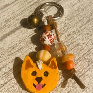 Handmade clay dog bag charm, cute and unique backpack adornment, useful autumn coloured keychain, pretty boho bag decor.