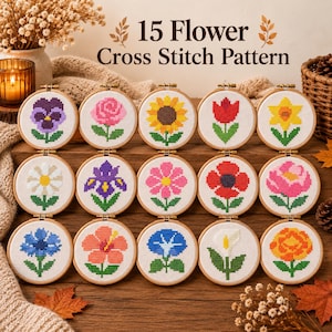 May include: Fifteen circular wooden embroidery hoops containing cross stitch patterns of various flowers, including a sunflower, rose, tulip, and pansy. The text 15 Flower Cross Stitch Pattern is displayed above the collection of floral designs.