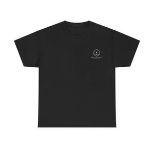 May include: A black short-sleeve t-shirt featuring a small white circular graphic on the upper left chest. The graphic depicts a stylized star above a curved horizon line with the text BEYOND ORION printed in white capital letters underneath.