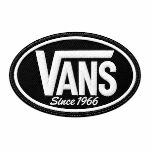May include: An oval-shaped embroidered patch featuring a black background with a white border. The text VANS is prominently displayed in white, with the smaller white text Since 1966 positioned directly underneath the brand name.