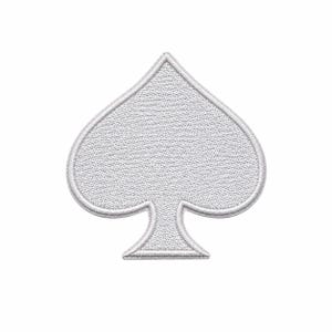 May include: A white embroidered patch in the shape of a spade playing card suit. The patch features a dense, textured thread pattern throughout the spade symbol and is finished with a clean, raised white stitched border around the entire edge.