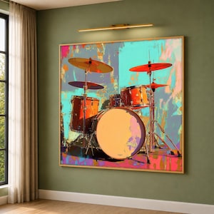 May include: A square wall art print featuring a drum kit with orange drums and metallic cymbals set against a vibrant, abstract background of turquoise, pink, and gold paint splatters. The composition highlights the drum shells and hardware.
