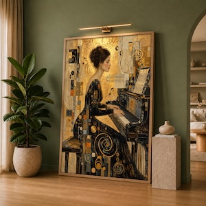 May include: A framed vertical wall art print featuring a side profile of a person playing a grand piano. The artwork uses a gold, black, and blue color palette with geometric patterns, musical notes, and abstract shapes. The print is illuminated by a thin, horizontal light fixture mounted directly above the frame.