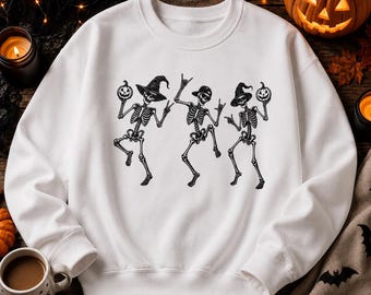 Dance of Skeletons Graphic Sweatshirt,Hoodie And T-Shirt — Vintage Halloween Skull Design