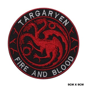 May include: A circular embroidered patch measuring 9cm by 9cm. The design features a red three-headed dragon on a black background, surrounded by the white text TARGARYEN and FIRE AND BLOOD. The border is stitched in red thread.