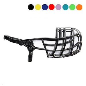 May include: A black dog muzzle with a basket design. The muzzle has a leather strap and buckle for secure fitting. The basket is made of a sturdy material, designed to allow the dog to breathe and drink.