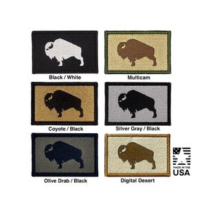 May include: Six rectangular embroidered patches featuring a bison silhouette. Color combinations include black and white, multicam, coyote and black, silver gray and black, olive drab and black, and digital desert. Text reads MADE IN THE USA.