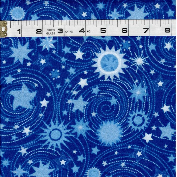 Flannel - Blue Celestial flannel w/ stars ranging from .5" to 2".  Fun for Baby, Burp Cloths, bibs, quilts, toys, robes, pajamas, ONE YARD