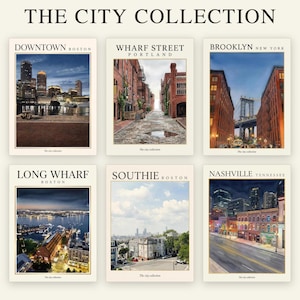 May include: A set of six rectangular art prints titled THE CITY COLLECTION, featuring photographic scenes of Downtown Boston, Wharf Street Portland, Brooklyn New York, Long Wharf Boston, Southie Boston, and Nashville Tennessee with text labels.