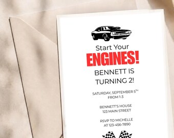 May include: A white rectangular invitation card featuring a black graphic of a muscle car at the top, the red text Start Your ENGINES!, and black text stating Bennett is turning 2, event details, and two crossed black and white checkered flags.