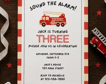 May include: A rectangular birthday invitation card with a red and white checkered border. The text reads: Sound the alarm! Jack is turning three. Please join us in celebrating. Saturday, September 5th from 1-3. Jack's house 123 Main Street. RSVP to Michelle at 123-456-7890.