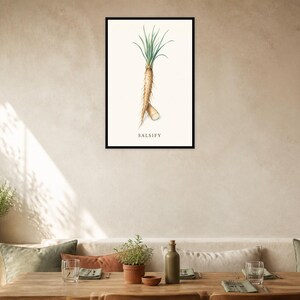 May include: A framed botanical wall art print featuring a detailed illustration of a salsify root with green leaves on a cream background. The word Salsify is printed in black capital letters at the bottom of the artwork within a thin black frame.