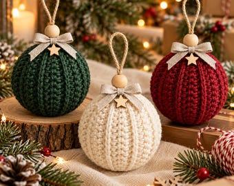May include: Three spherical ornaments featuring a ribbed crochet texture in dark green, cream, and deep red. Each ornament is topped with a natural wooden bead, a beige fabric bow, a small wooden star, and a jute twine loop for hanging.