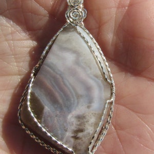 Mozarkite Cabochon wire wrapped pendant in Argentium Sterling Silver