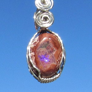 Cantera Opal  Pendant. wire wrapped in Silver filled wire