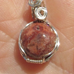 Cantera Opal  Pendant. wire wrapped in Silver filled wire