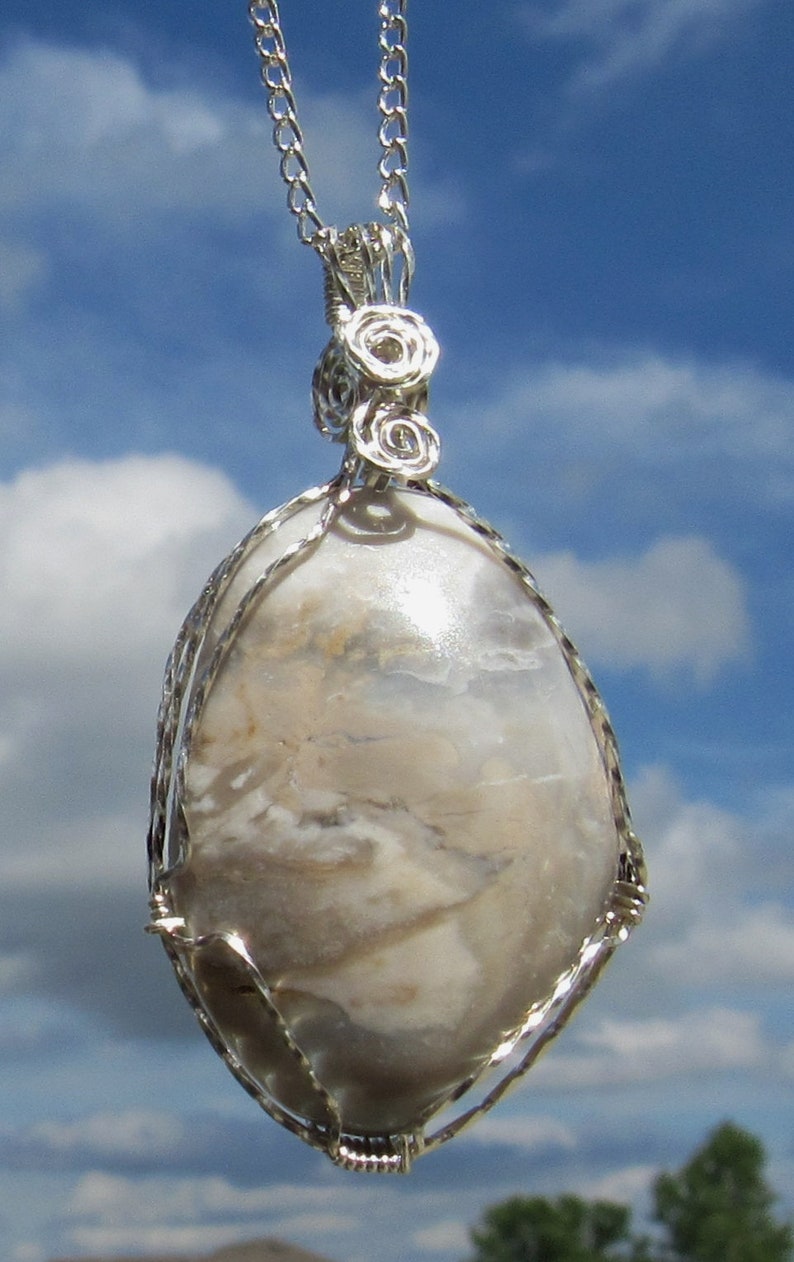 Mozarkite Cabochon wire wrapped pendant in Argentium Sterling Silver