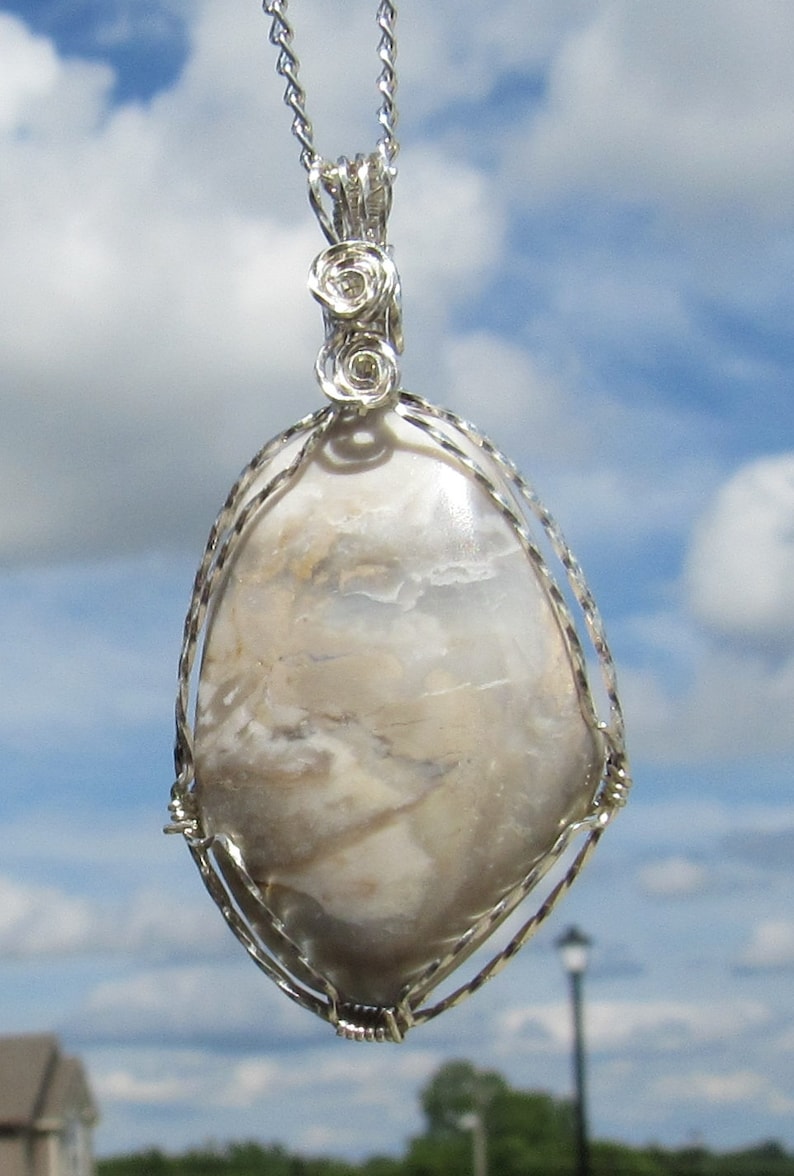 Mozarkite Cabochon wire wrapped pendant in Argentium Sterling Silver