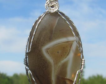 Pendentif enveloppé de fil d'agate cabochon en argent sterling argntium