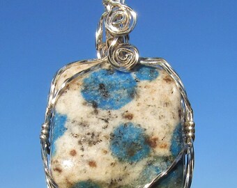 K-2 granite ,   free form  Cabochon  wire wrapped in Argentium Silver wire