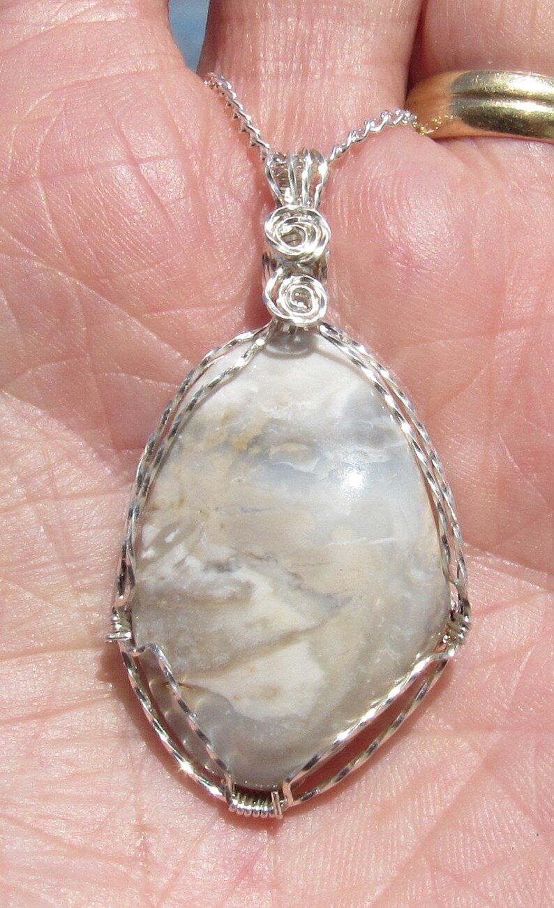 Mozarkite Cabochon wire wrapped pendant in Argentium Sterling Silver