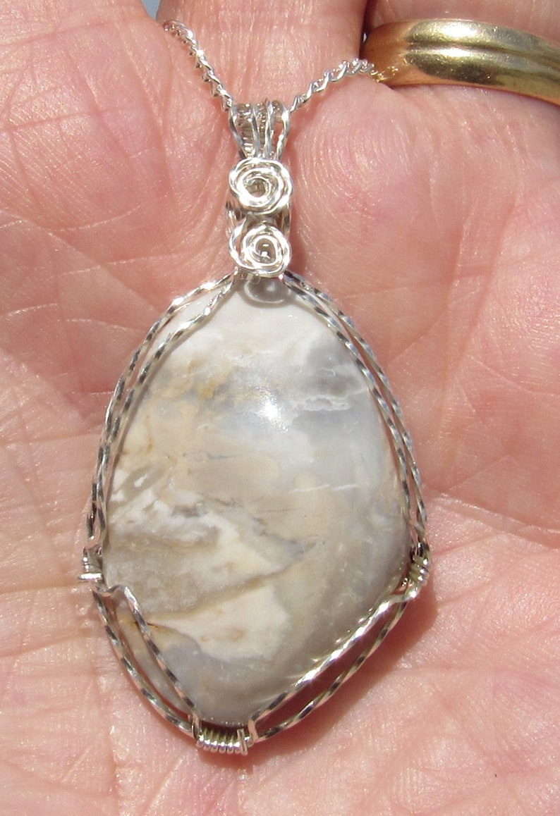 Mozarkite Cabochon wire wrapped pendant in Argentium Sterling Silver