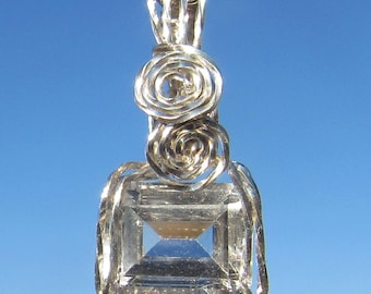 Collier en argent avec topazes facettées et taille émeraude