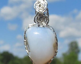Blue Chalcedony  pendent  wrapped in silver