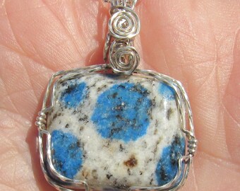 K-2 granite ,   free form  Cabochon  wire wrapped in Argentium Silver wire