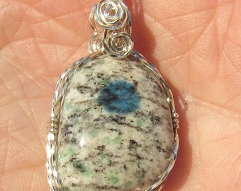K-2 granite ,   free form  Cabochon  wire wrapped in Argentium Silver wire