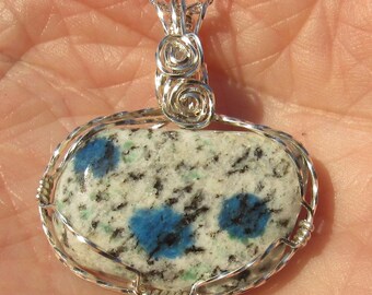 K-2 granite ,   free form  Cabochon  wire wrapped in Argentium Silver wire