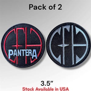 May include: A pack of 2 circular embroidered patches measuring 3.5 inches. One patch features a red circular border and cross design with the word PANTERA in light blue. The other patch features a silver circular border and cross design.