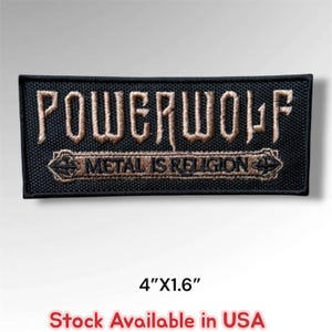 May include: A rectangular black embroidered patch featuring the text POWERWOLF in a tan font above a smaller banner containing the text METAL IS RELIGION. The patch measures 4 inches by 1.6 inches and has a black stitched border.