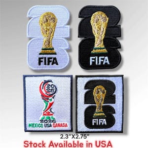 May include: Four embroidered patches featuring FIFA World Cup 2026 designs. Two patches show the trophy over the number 2026 in white and black. Two rectangular patches feature the 2026 trophy logo and text. Dimensions are 2.3 inches by 2.75 inches.