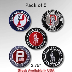 May include: A pack of 5 circular embroidered patches featuring Polo Ralph Lauren branding. Each patch measures 3.75 inches in diameter. The designs include various combinations of the letter P, the polo player logo, and the text 1967 in red, white, blue, and black.