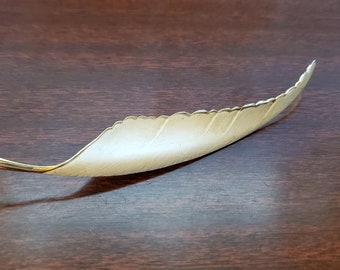 White Enamel on Gold Feather Brooch