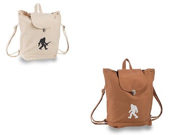 Squatch Embroidered Heavy Canvas Backpacks with cell phone pocket; 2 designs; Personalizable; 3 colors to choose from