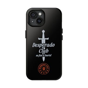 May include: A black smartphone case featuring a white graphic of a sword behind the text Desperado Club and the phrase so fun it hurts. Below this is a circular orange emblem containing a skull icon and the words MEMBERS ONLY with five stars.