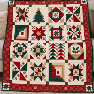 May include: A patchwork quilt featuring a grid of sixteen square blocks with Christmas-themed patterns including stars, a pine tree, and holly leaves. The quilt is bordered by a red fabric with a floral print and has a cream-coloured background.