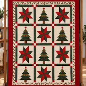 May include: A rectangular quilt featuring a grid of alternating blocks with red and green star patterns and green Christmas tree designs with red ornaments. The quilt has a cream-coloured background, a holly-patterned border, and a solid red edge.