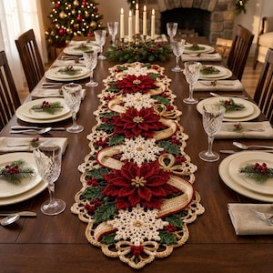 May include: A long, rectangular crochet table runner featuring a festive holiday design with deep red poinsettia flowers, white snowflake motifs, green holly leaves, and small red berries, accented by tan ribbon-like crochet trim.