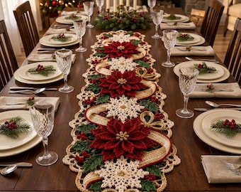 May include: A long, rectangular crochet table runner featuring a festive holiday design with deep red poinsettia flowers, white snowflake motifs, green holly leaves, and small red berries, accented by tan ribbon-like crochet trim.