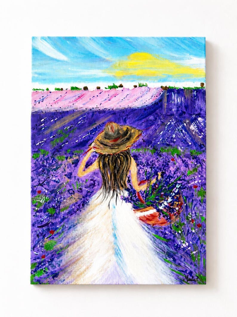 May include: An acrylic painting on canvas depicting a figure from behind, wearing a wide-brimmed straw hat and a long white dress, walking through a vibrant purple lavender field while carrying a basket filled with freshly picked lavender flowers.