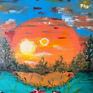 May include: An acrylic painting on canvas depicting a vibrant orange sun setting over a landscape with dark silhouettes of trees. The foreground features teal water with scattered red and white flowers. The sky is a mix of bright blue and dark clouds.