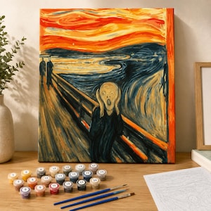 Peut inclure: Un kit de peinture par numéros comprenant une toile reproduisant Le Cri, montrant une silhouette centrale la bouche ouverte sur un pont. L'ensemble inclut vingt-quatre petits pots de peinture circulaires numérotés et trois pinceaux.