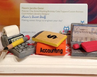 Polymer clay business card designed for an Accountant