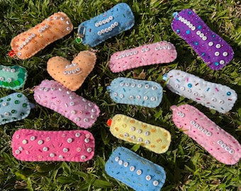 Adornos de fieltro hechos a mano para bolsos de pañales