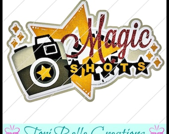 May include: A graphic design featuring a camera with a yellow star lens, a large yellow star background, and the text Magic SHOTS in red and black. Small yellow stars surround the design, which is labelled Tori Belle Creations.