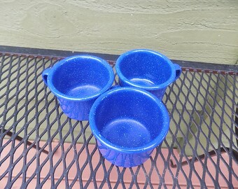 Three 4 oz blue enamelware mugs